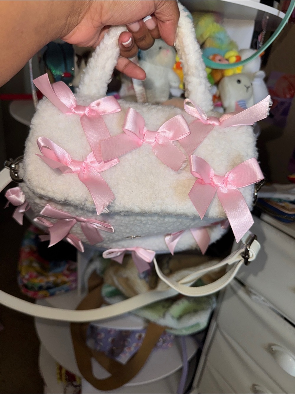 Dolls Kill White Faux Shearling Crossbody Bag with Pink Ribbon Bows